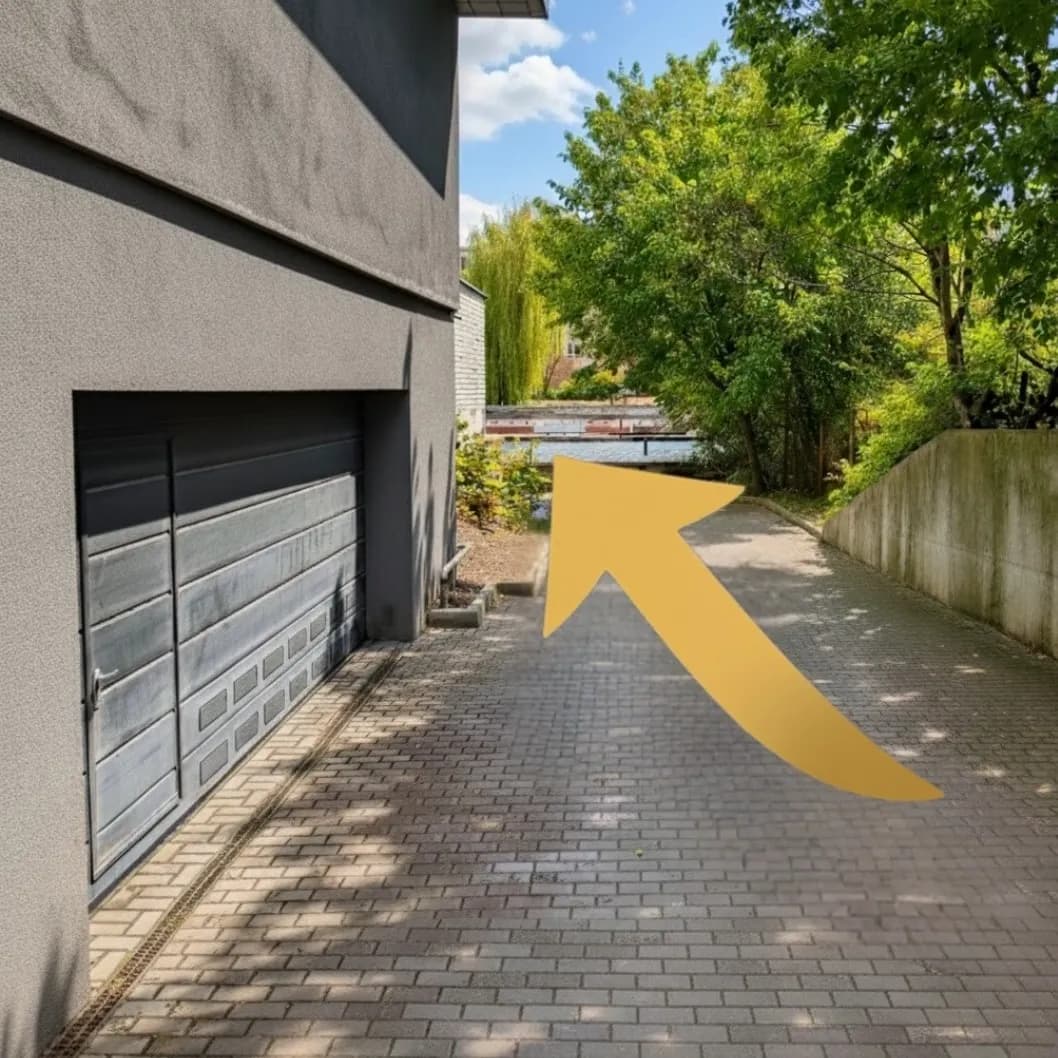 At the bottom, turn left behind the building.